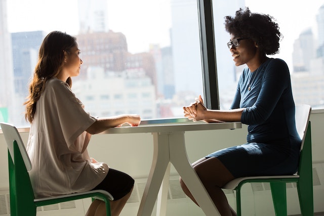 people sitting at table for interview